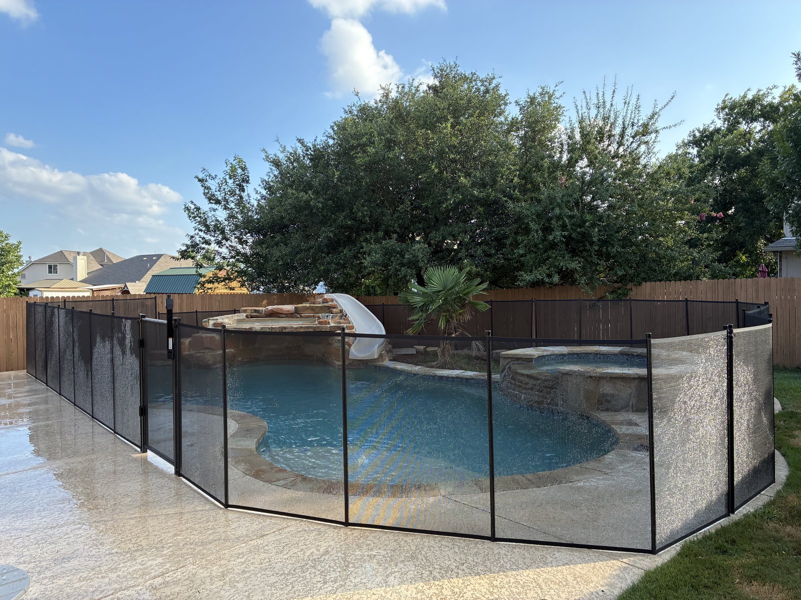 Removable mesh pool fence installation in Dripping Springs TX, All-Safe certified