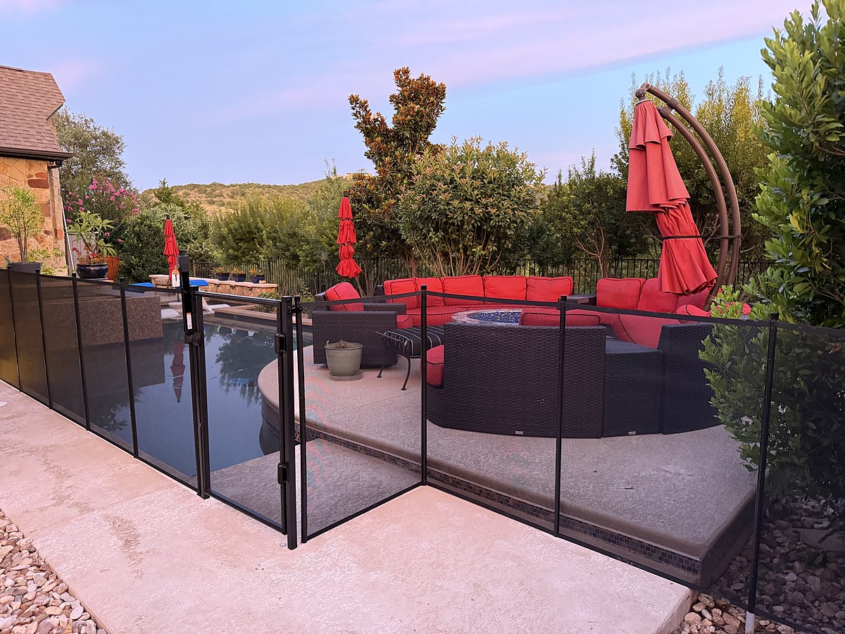 Removable mesh pool fence installation in Bee Cave TX, All-Safe certified